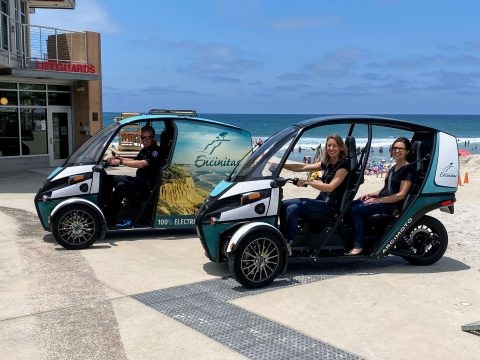 Encinitas Mayor Catherine Blakespear takes her first ride in an Arcimoto FUV as part of a joint pilot program with Arcimoto to test ultra-efficient EVs for daily use by the Encinitas Lifeguards as well as the Infrastructure and Sustainability Departments. Photo by City of Encinitas